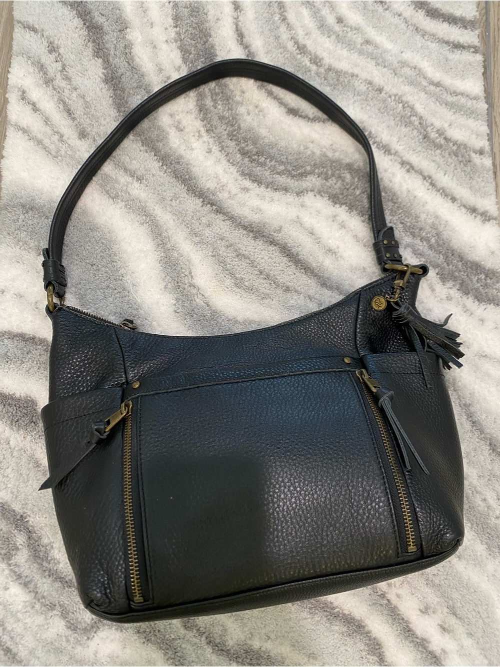 The Sak Black Pebbled Leather Shoulder Bag with Tassel